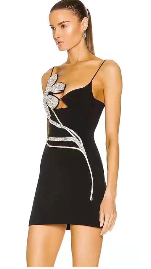 Vestido Bandage negro con flor plateada. - Imagen 1